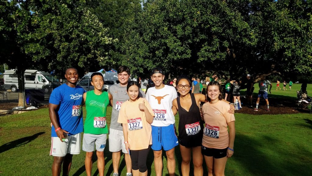 Dan Yang (second from left), Trevor Anderson (third from left), Vicki Yang (middle front), and Flora Sun (second from right) ran for team Go MPA!