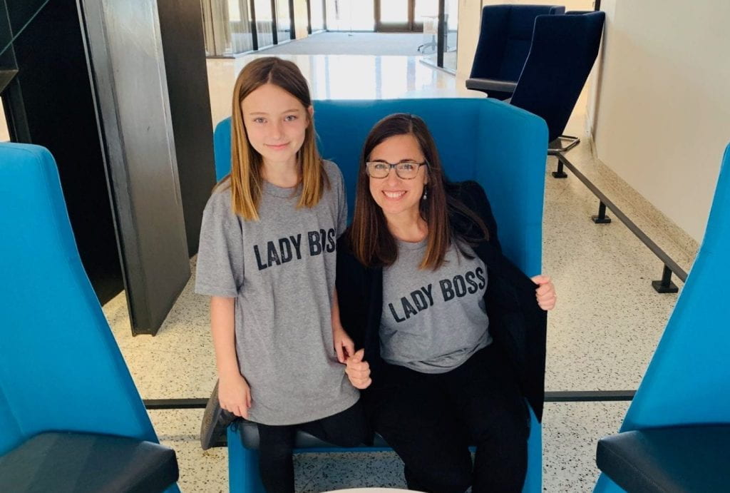 Assistant Dean Tina Mabley and her daughter in matching "Lady Boss" shirts. 