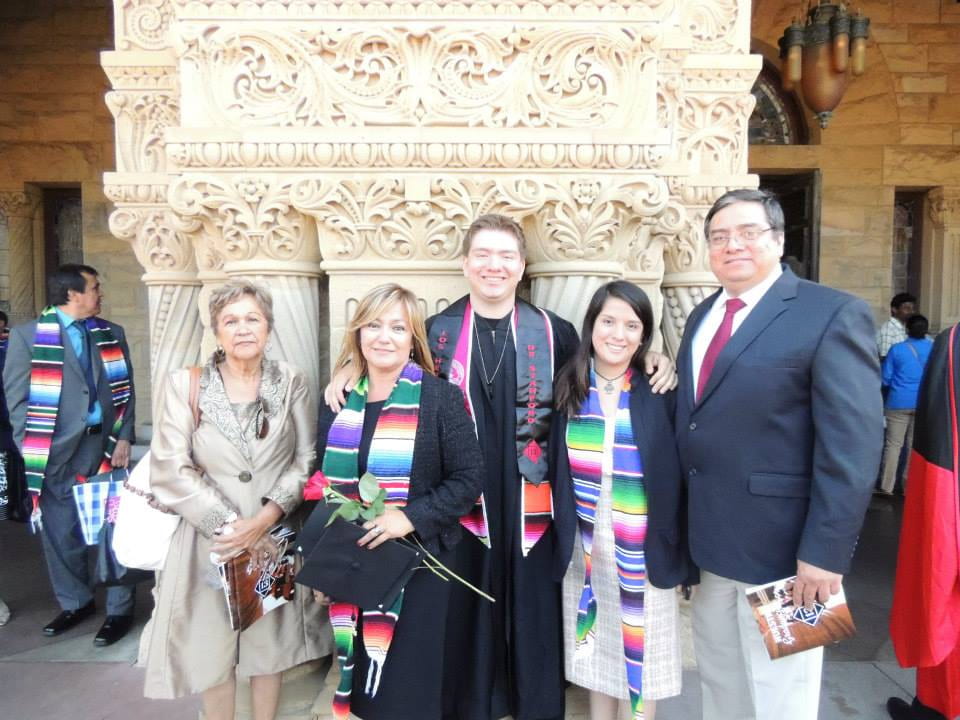 Mario and his family at his college graduation in 2013.
